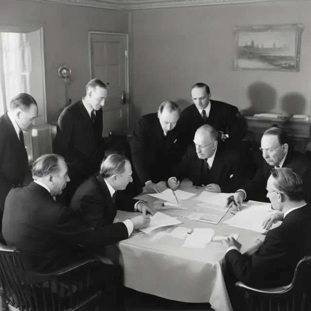 Keynes and White shaping the Bretton Woods System, surrounded by currency symbols