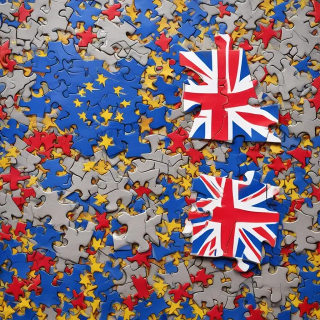 Two jigsaw puzzles interconnected, each with unique pieces representing the UK and EU economies, emphasizing the complexities of Brexit