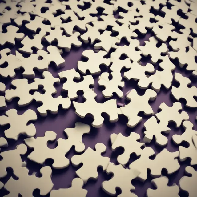 An image of various interconnected puzzle pieces representing workforce skills and business goals, creating a cohesive HR strategy