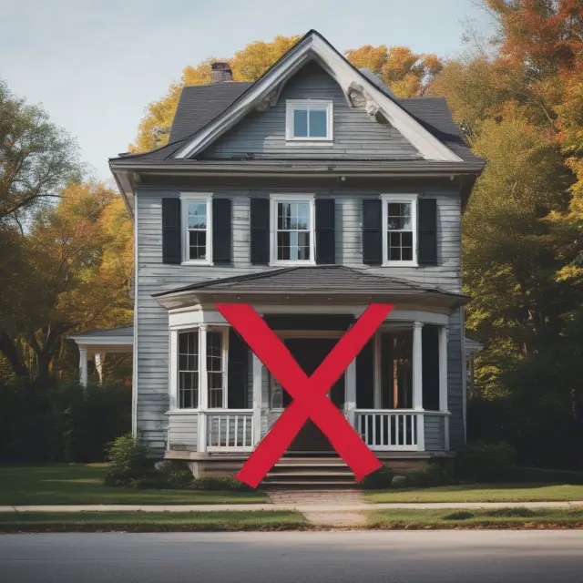 An old house with a large red 